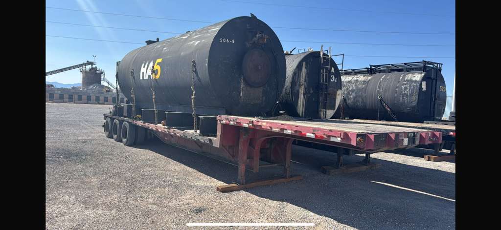 Barcelona Express tractor hauling a large industrial tank